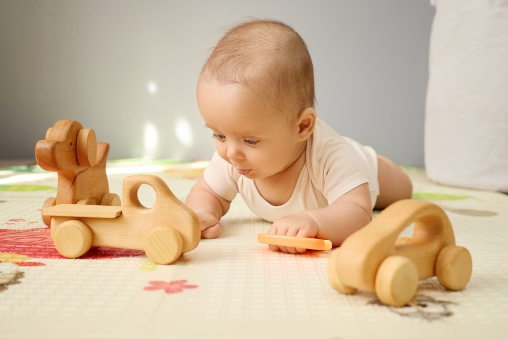 Wooden toys for tummy time